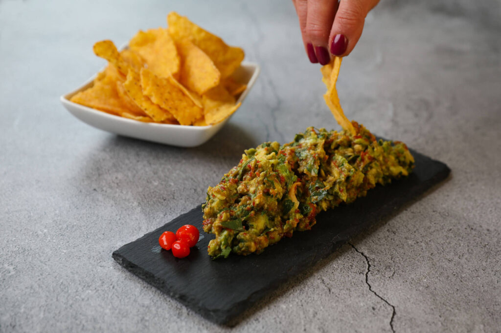 dipping TIGER LILY PEPPER & LIME SAMBAL GUACAMOLE